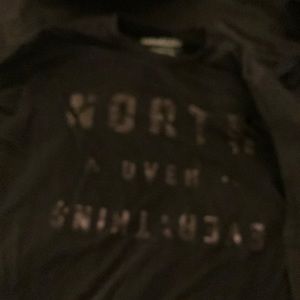Mitchell & Ness LS Black “North Over Everything” Shirt